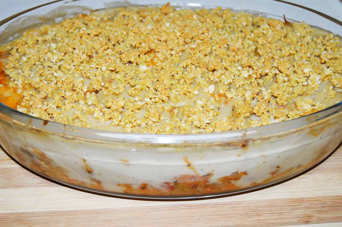 Col gratinada con queso rallado