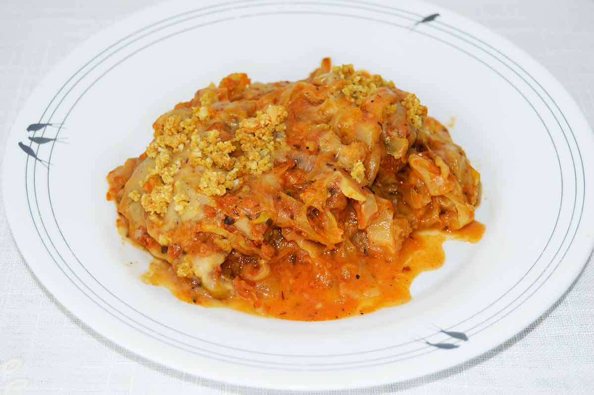 Col gratinada con queso rallado